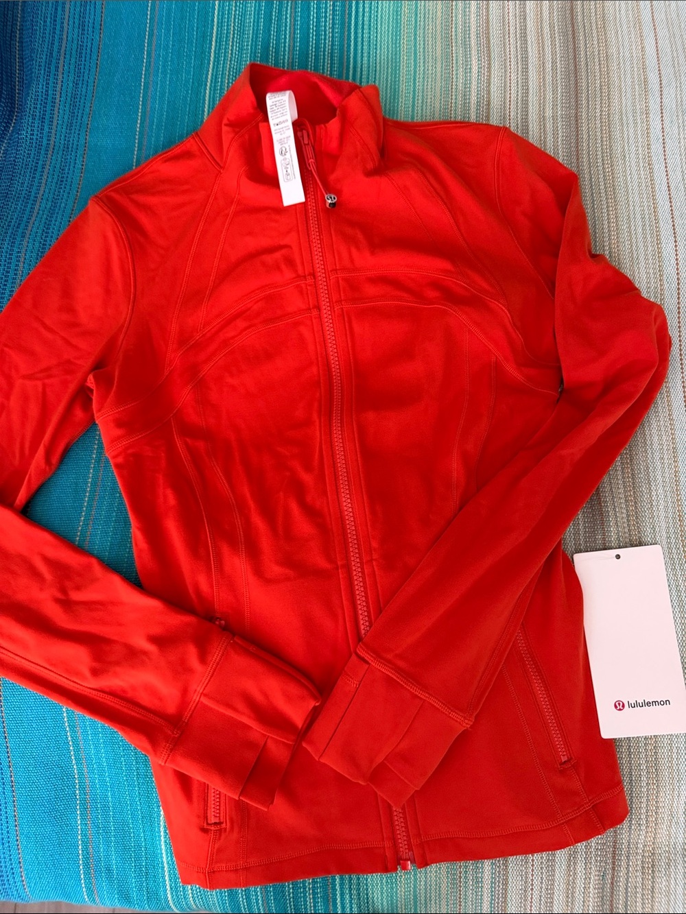 lululemon athletica Women’s Bright Orange Full-Zip Define Jacket